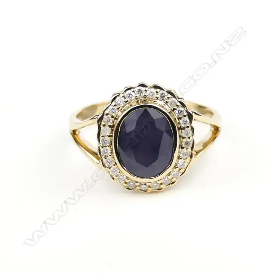 A 14ct. gold sapphire and diamond ring