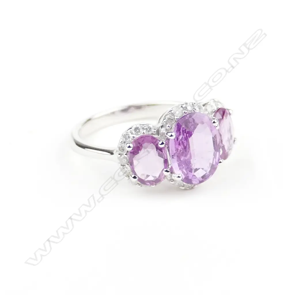A 14ct. white gold pink sapphire and diamond ring Image 1++