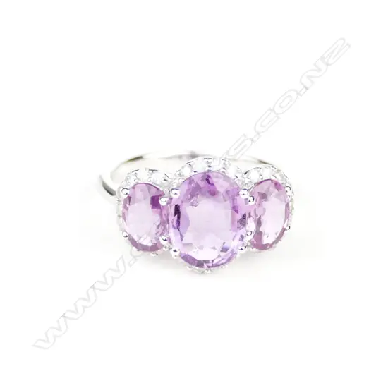 A 14ct. white gold pink sapphire and diamond ring