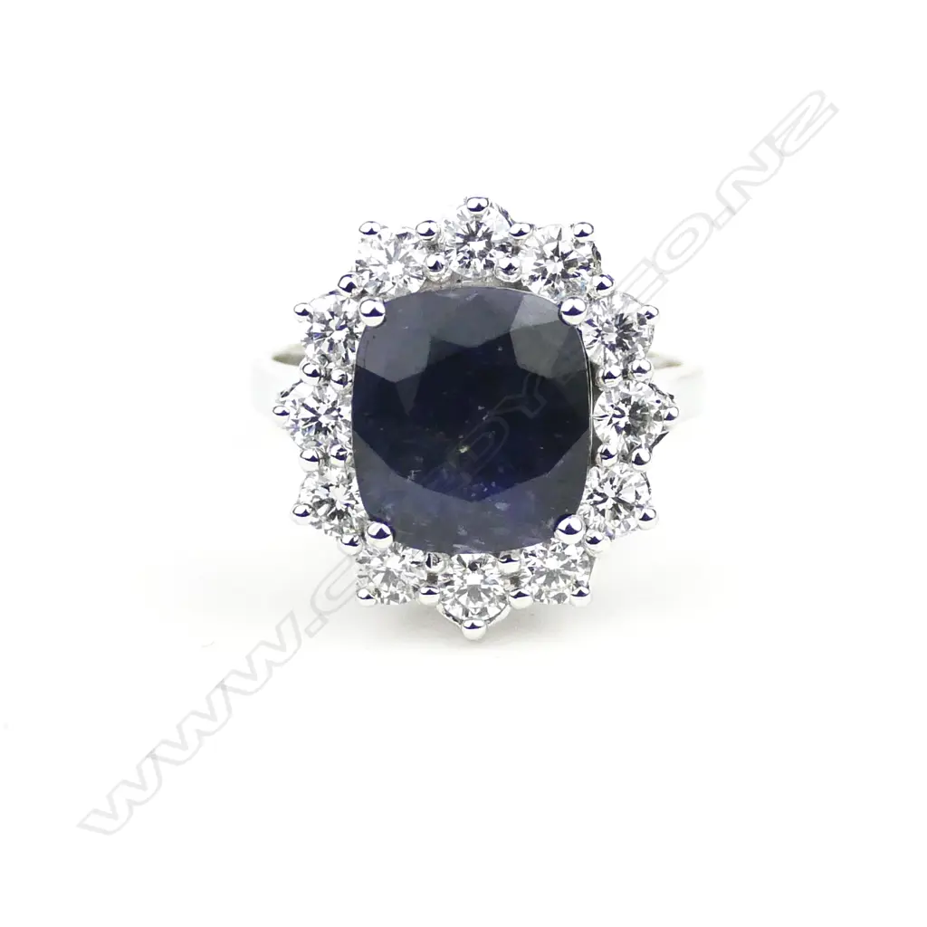 A 14ct. white gold sapphire and diamond ring Image 1++