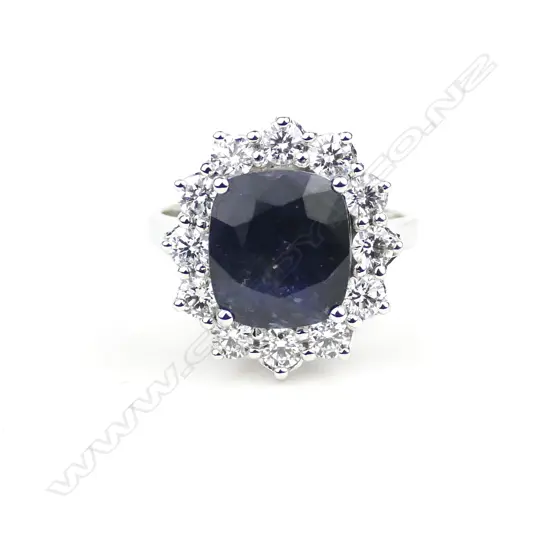 A 14ct. white gold sapphire and diamond ring