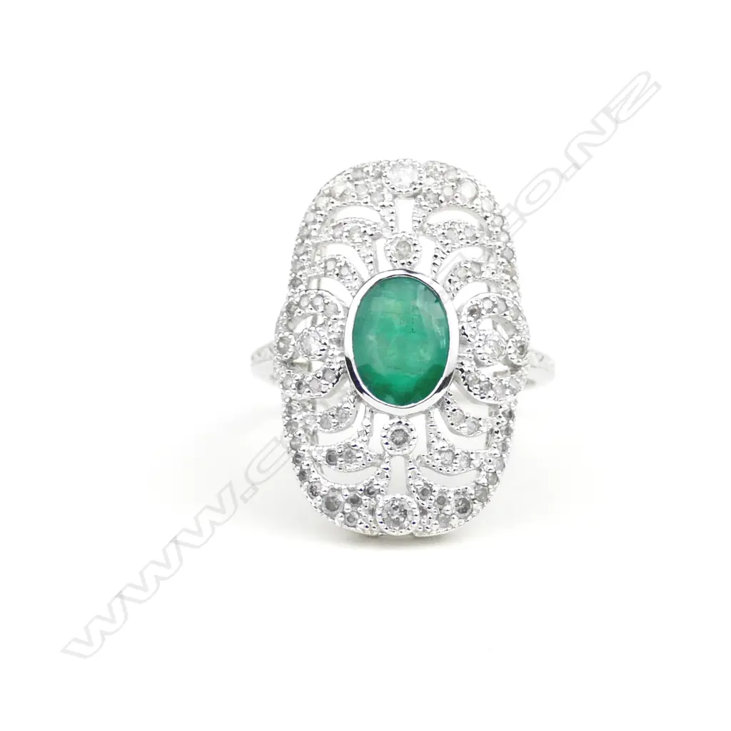 An 18ct. white gold emerald and diamond Art Deco style ring Image 1++