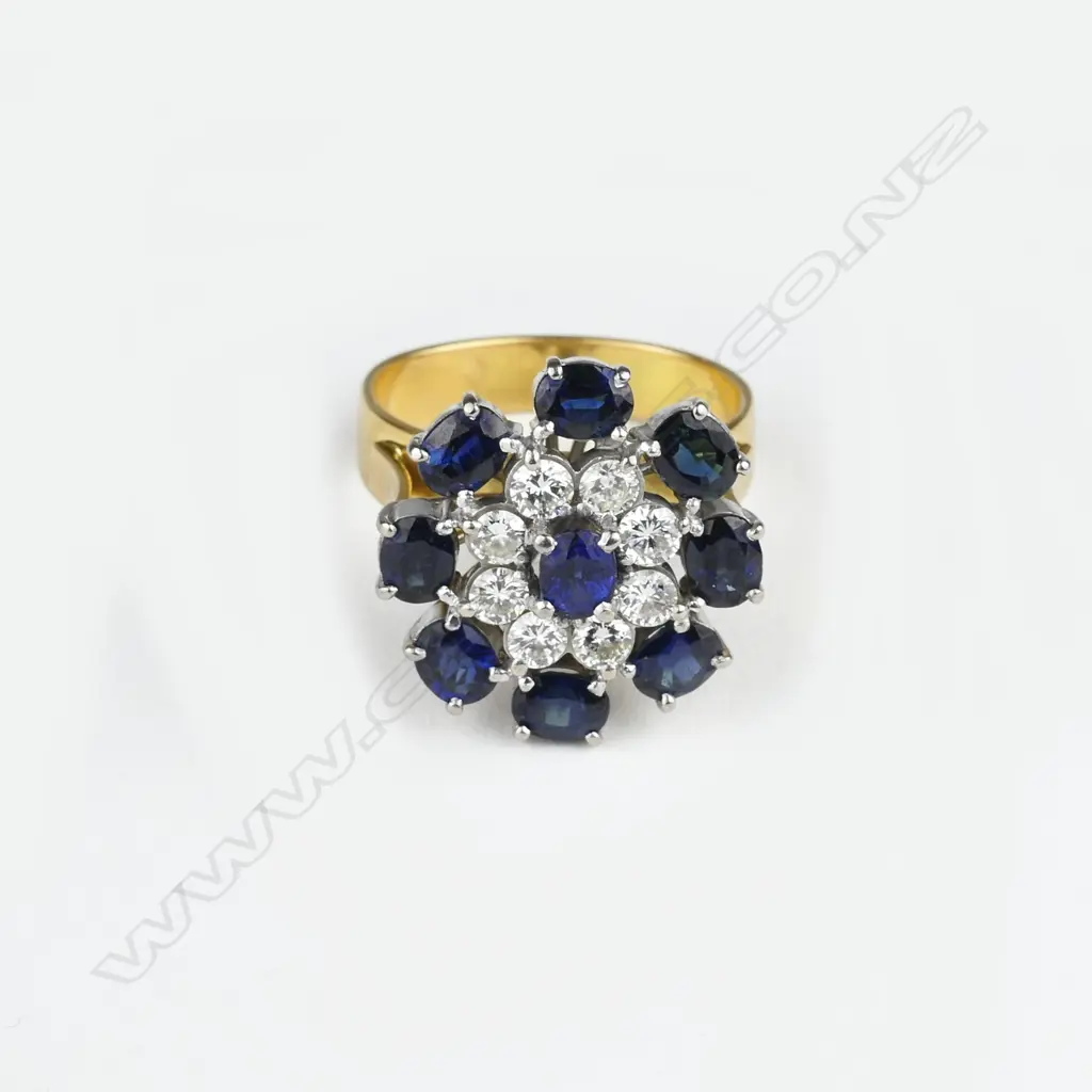 An impressive 18ct. gold sapphire and diamond dress ring Image 1++