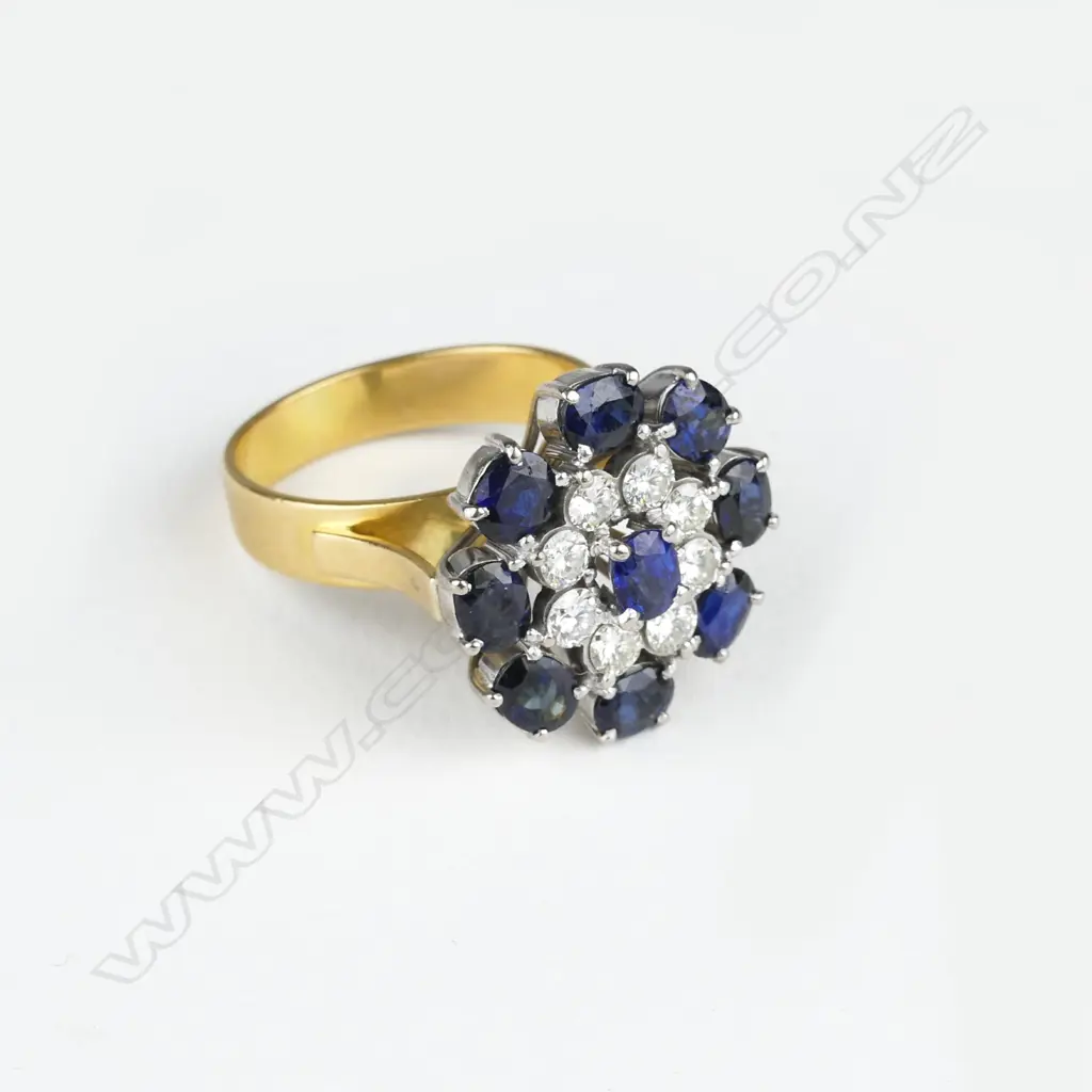 An impressive 18ct. gold sapphire and diamond dress ring Image 1++