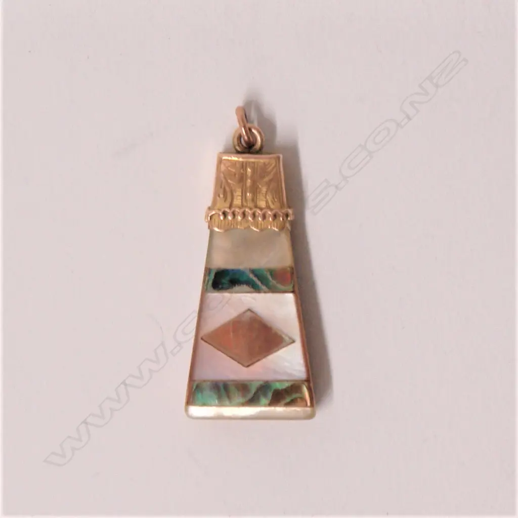 A late 19thC colonial gold and abalone mounted mother-of-pearl pendant Image 1++