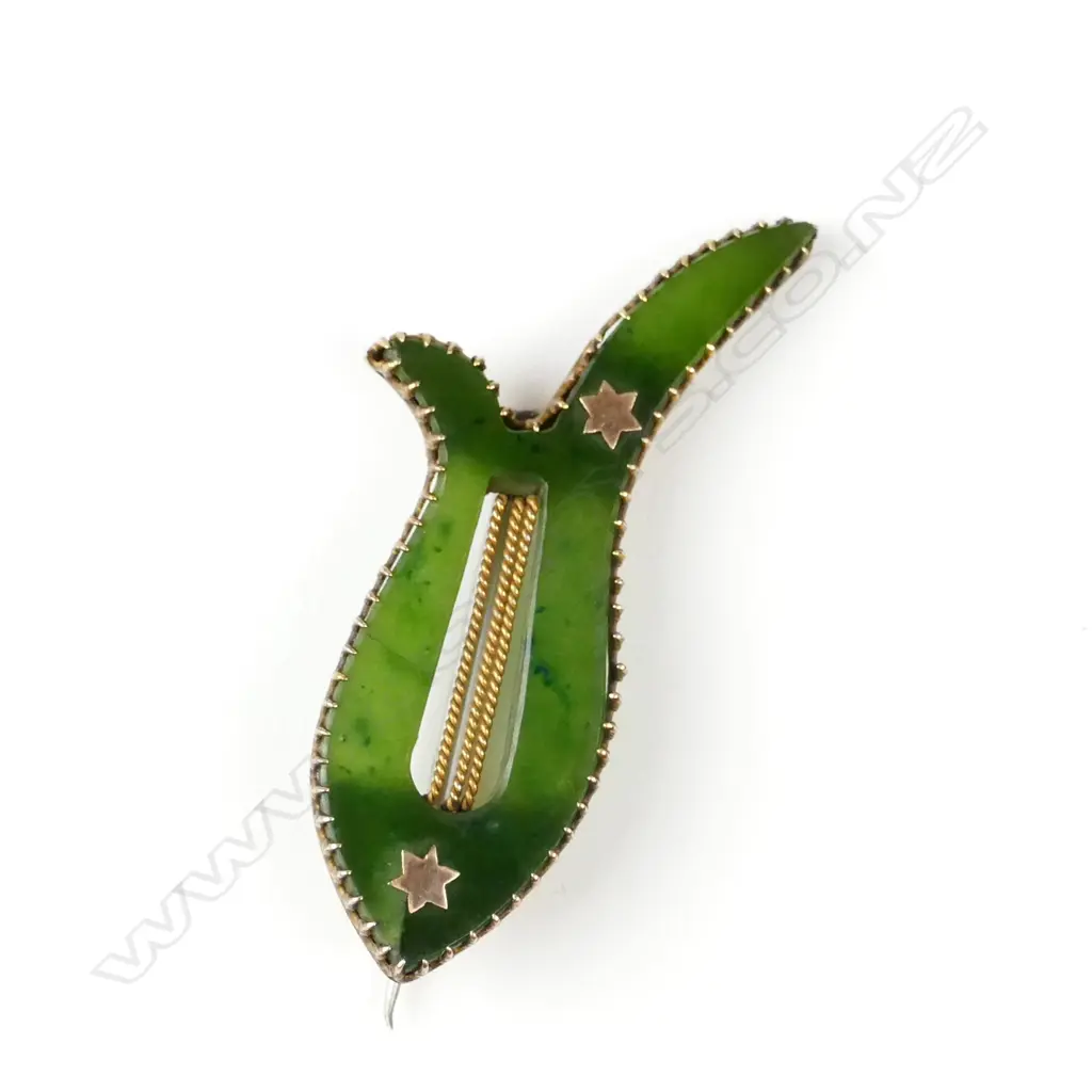 An early 20thC 9ct. yellow gold and nephrite lyre form brooch Image 1++