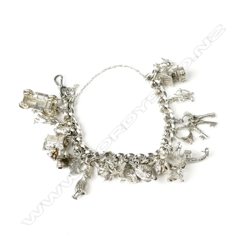 A silver charm bracelet Image 1++