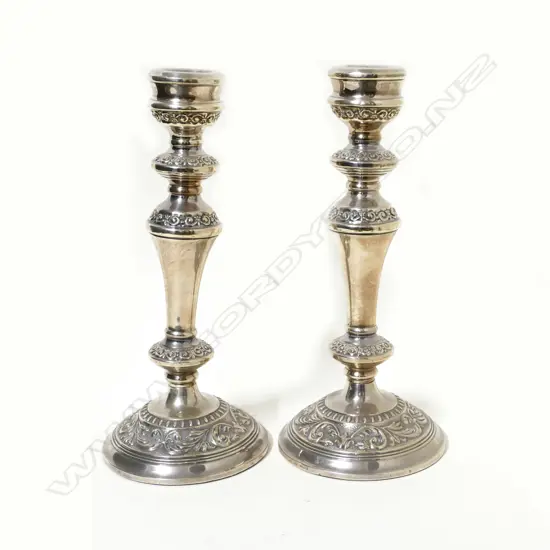 A pair of silver candlesticks