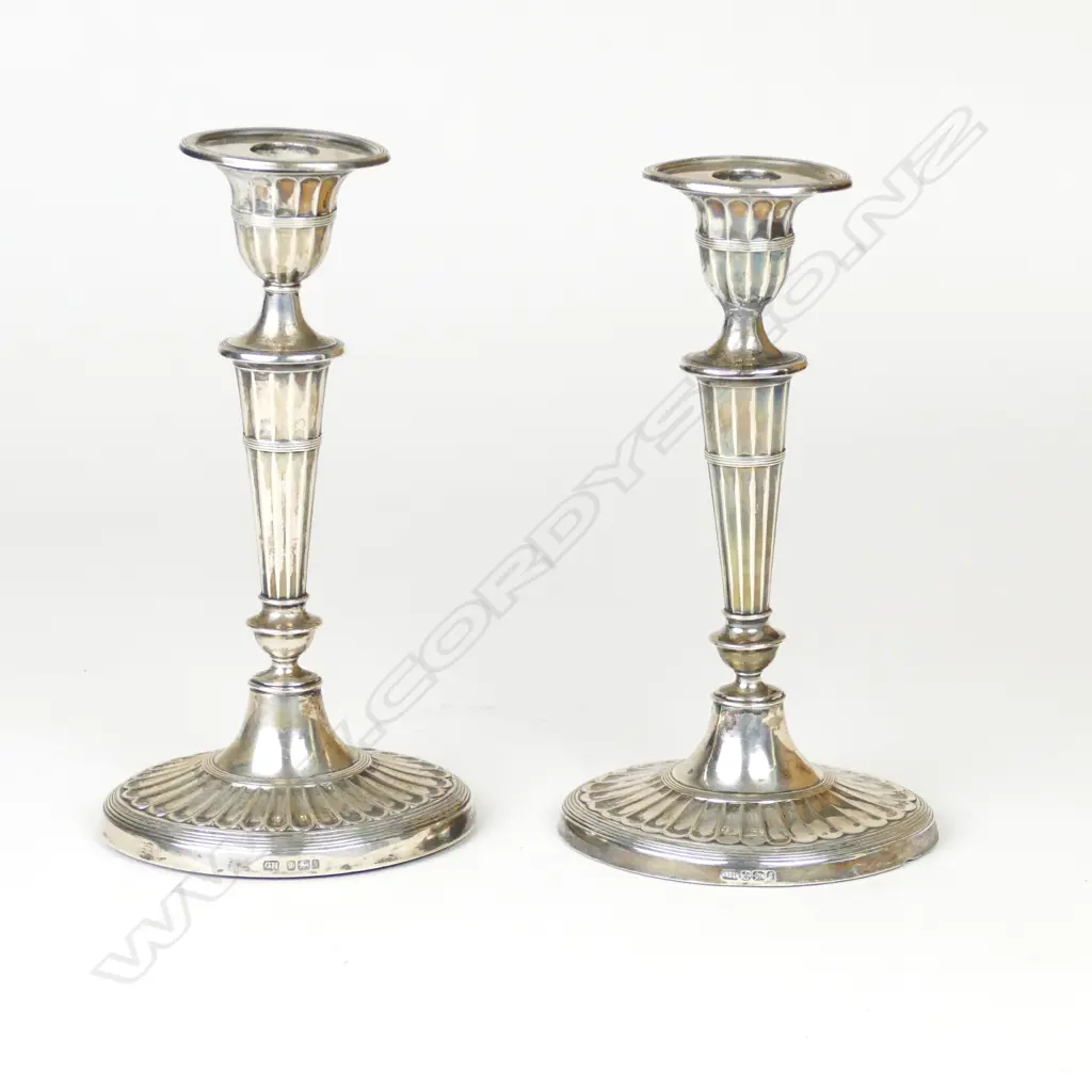 A pair of late Victorian silver candlesticks Image 1++