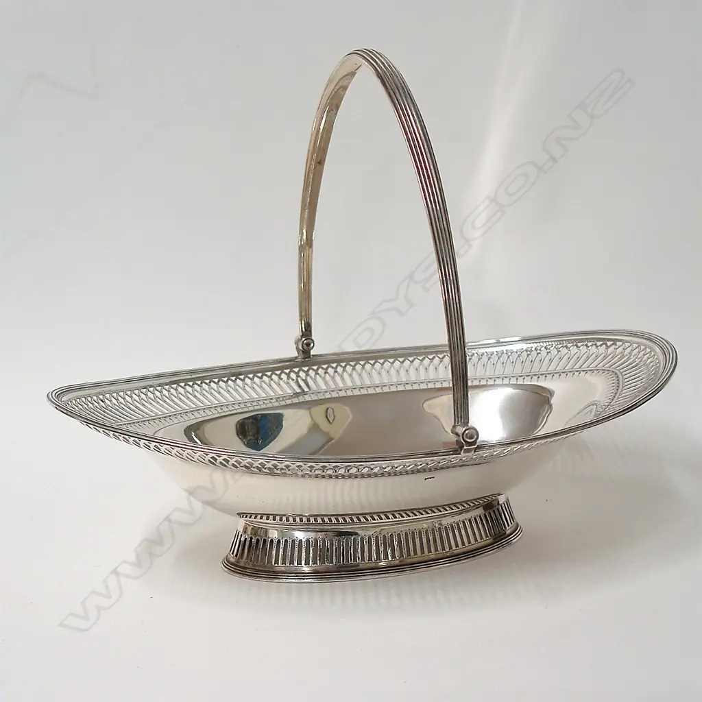 A George III impressive large silver swing handled basket Image 1++