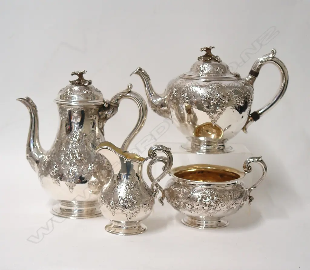 An impressive Victorian silver oak boxed four-piece tea and coffee service Image 1++