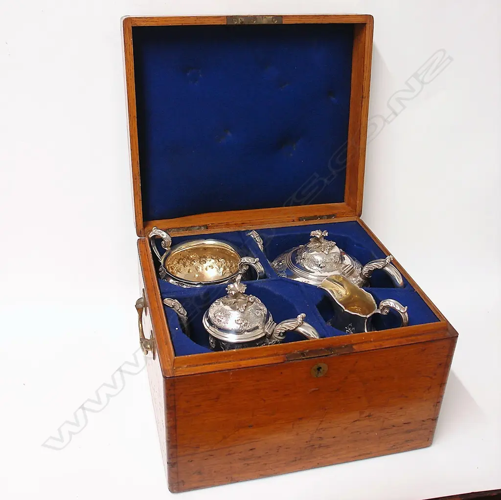 An impressive Victorian silver oak boxed four-piece tea and coffee service Image 1++