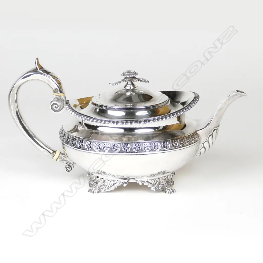 A George III large silver teapot Image 1++