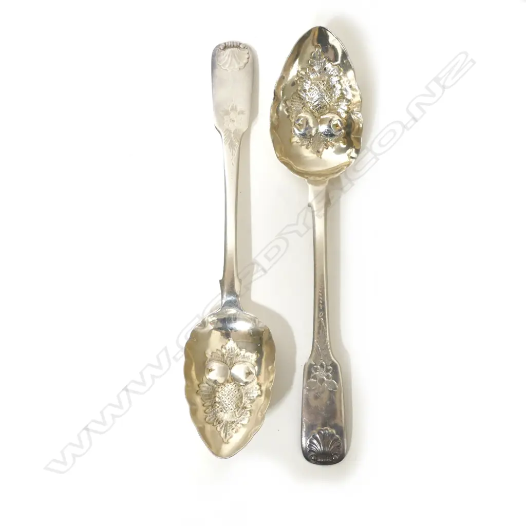 A pair of George III silver berry spoons Image 1++