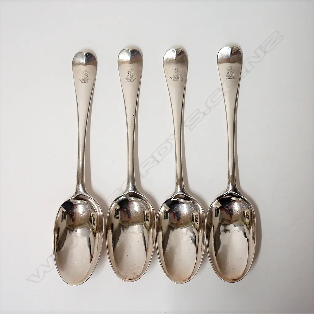 A set of four George II silver Hanoverian tablespoons Image 1++