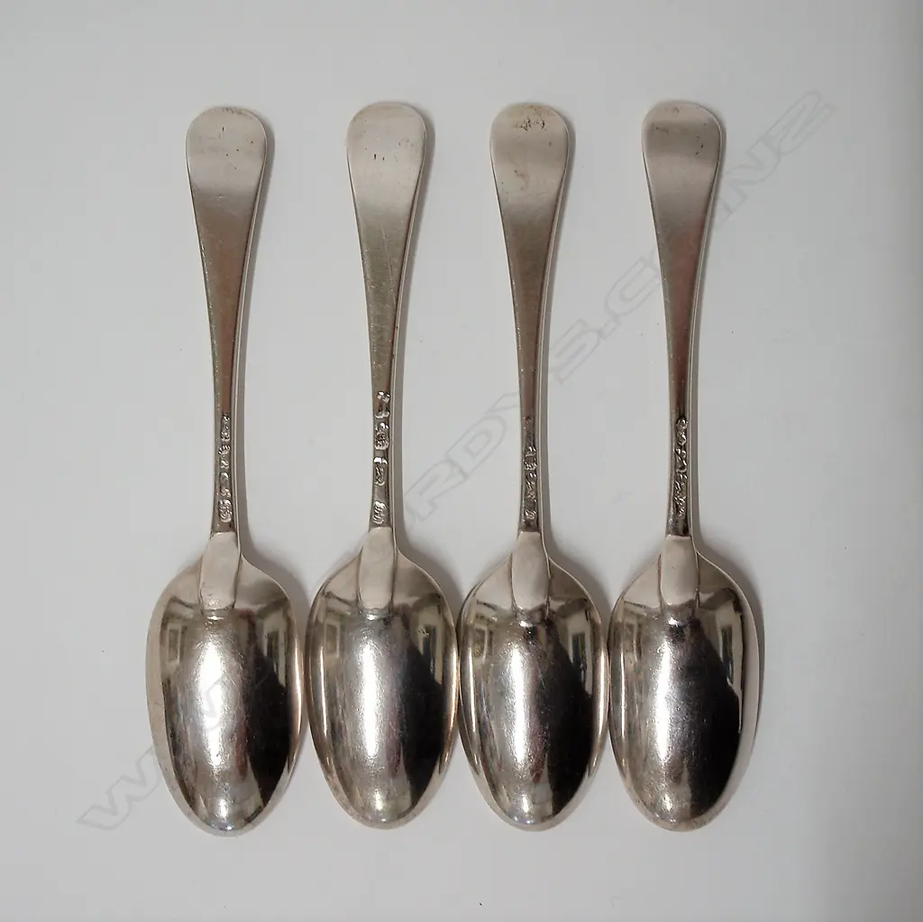 A set of four George II silver Hanoverian tablespoons Image 1++