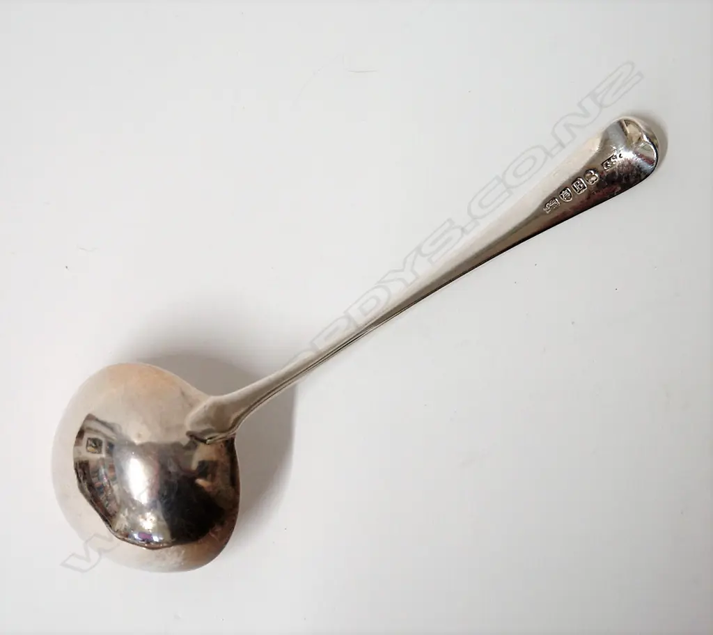 A George III silver sauce ladle Image 1++