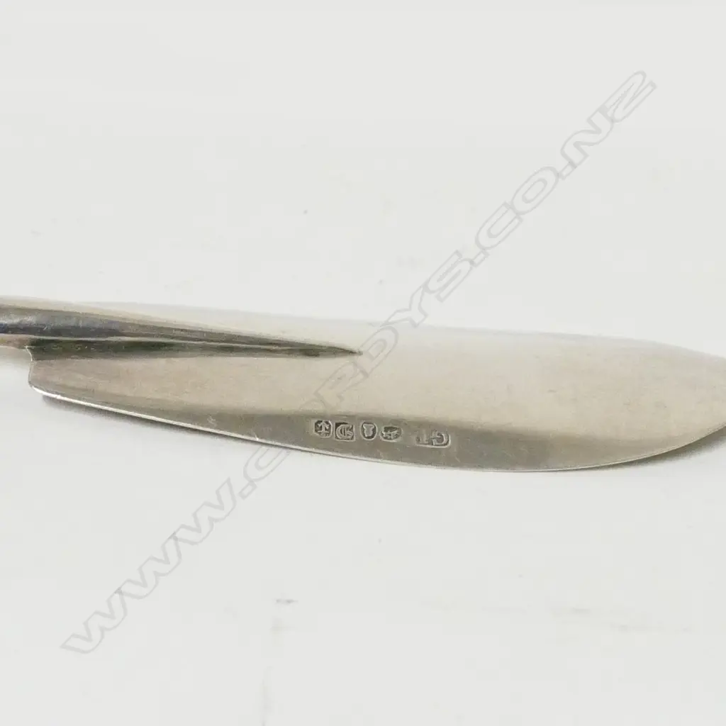 A George IV silver butter knife Image 1++