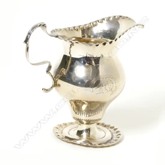 A Georgian silver cream jug