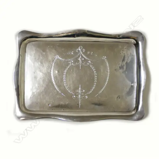 An early 1900's silver dressing table tray