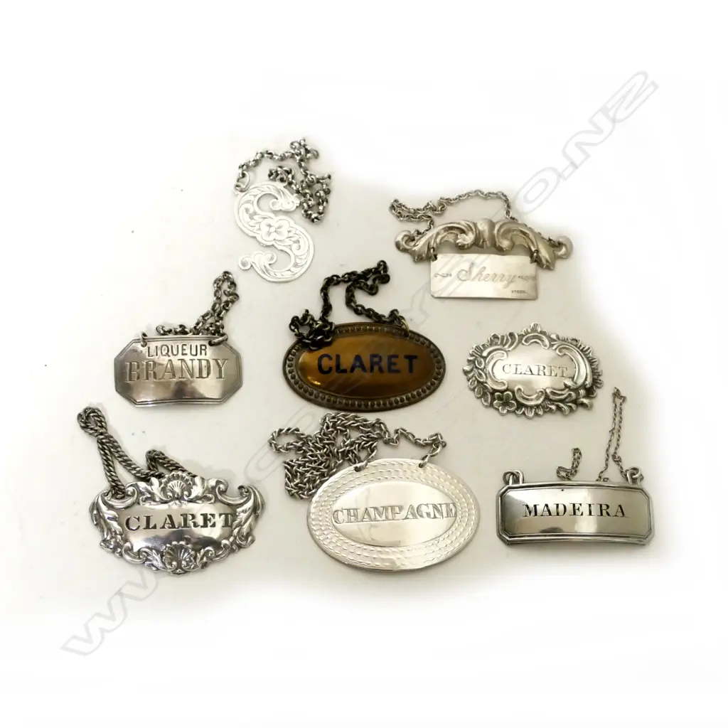 A collection of eight vintage bottle tickets Image 1++