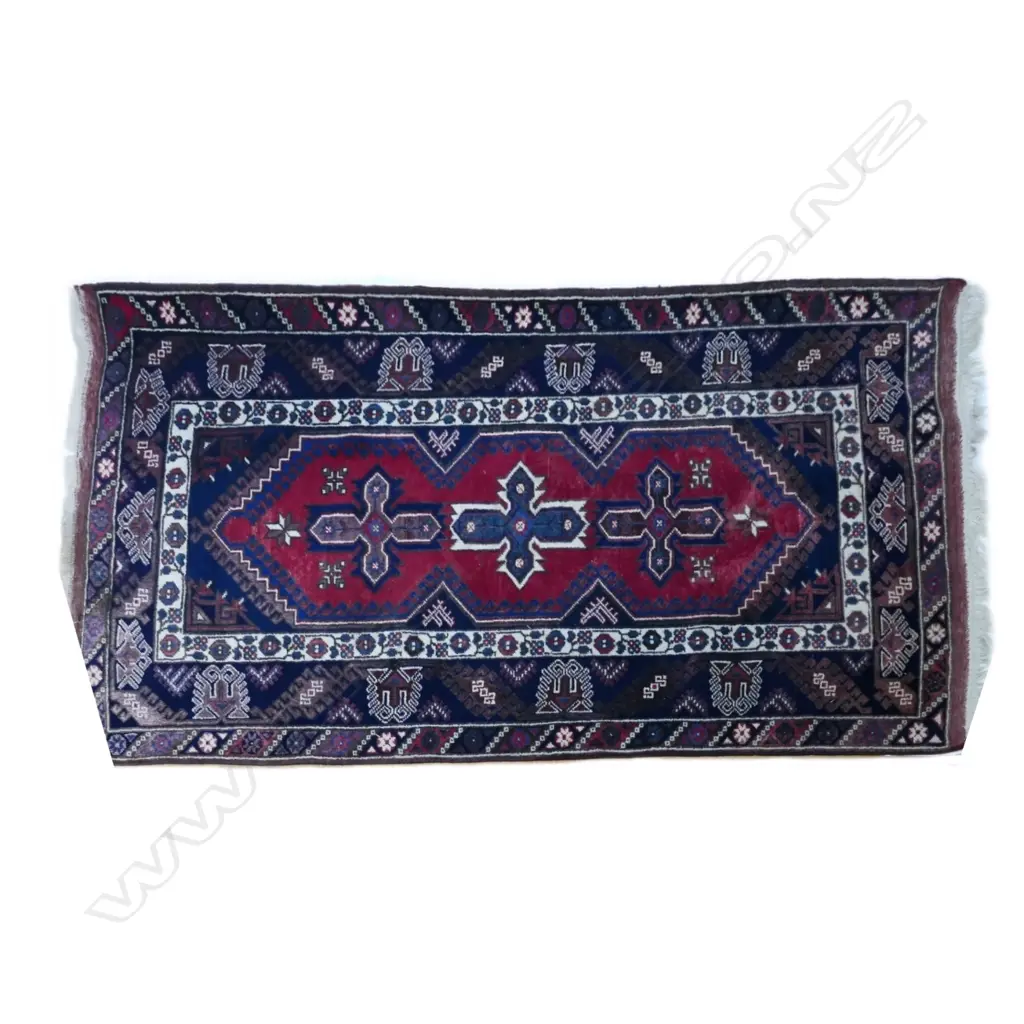 A hand knotted Turkish rug with bold geometric floral designs Image 1++