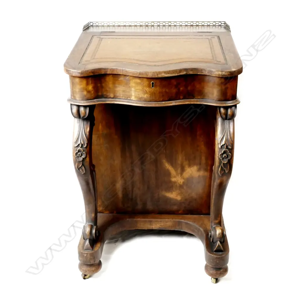 A Victorian walnut Davenport Image 1++