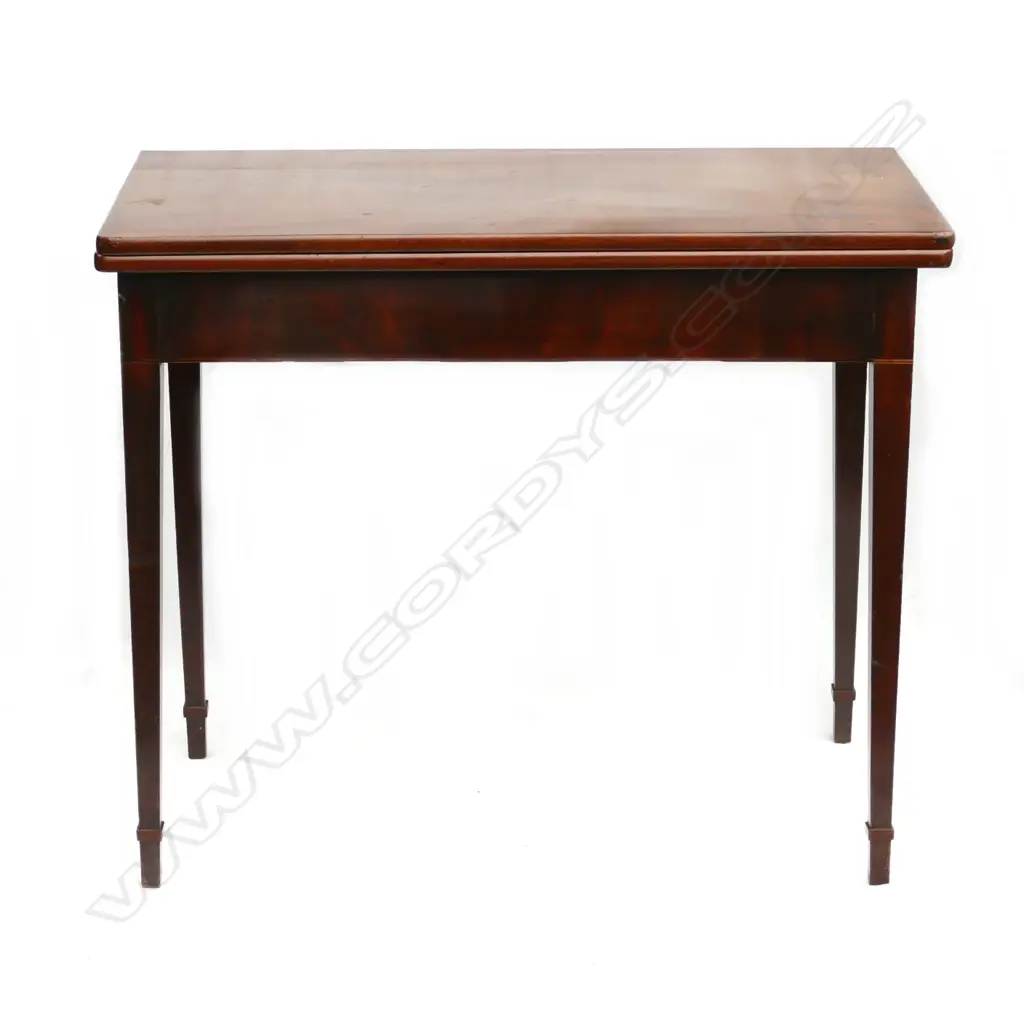 A late Georgian mahogany fold-over top tea table Image 1++