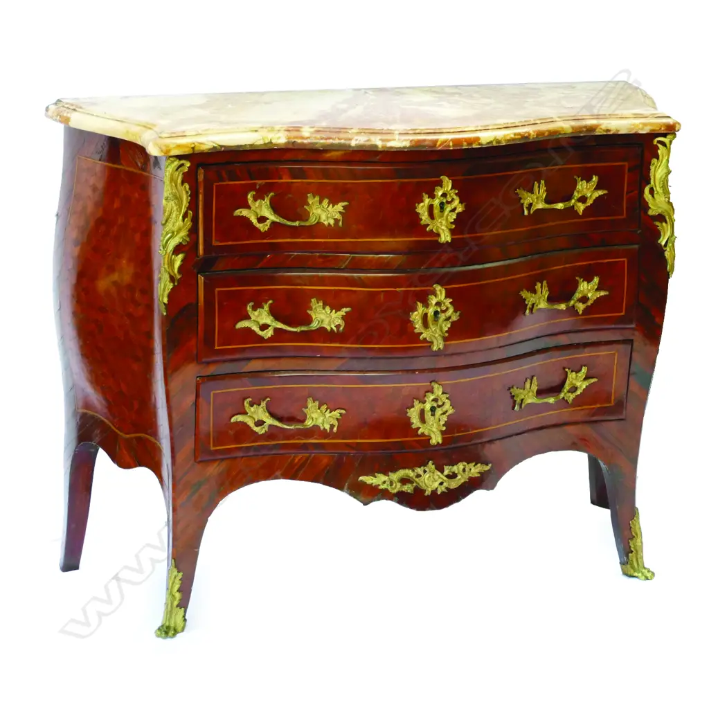 A French three-drawer bombé commode of rare cocobolo wood Image 1++