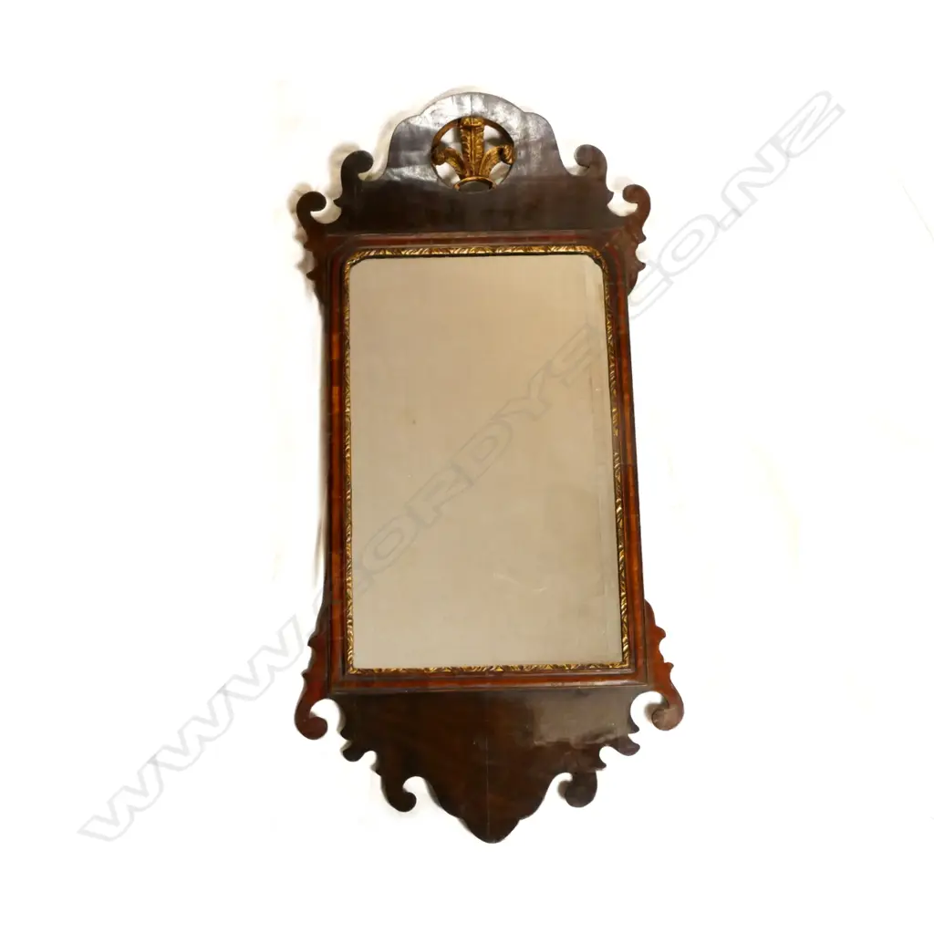 A Georgian mahogany 'Chippendale' pier glass with cut-out decoration Image 1++