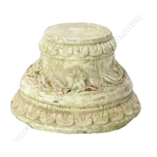 A large concrete outdoor garden urn base