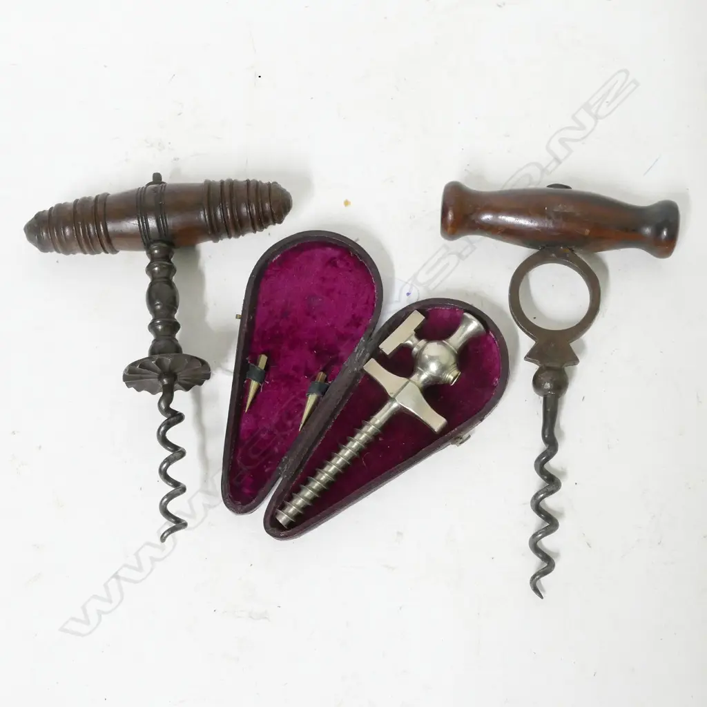 A cased 19thC champagne tap and two corkscrews Image 1++