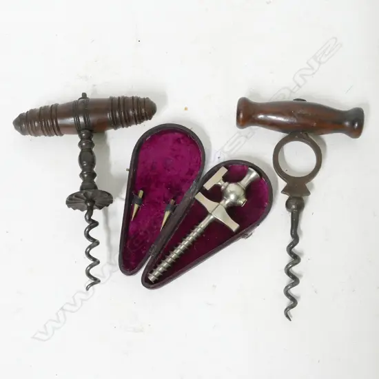 A cased 19thC champagne tap and two corkscrews
