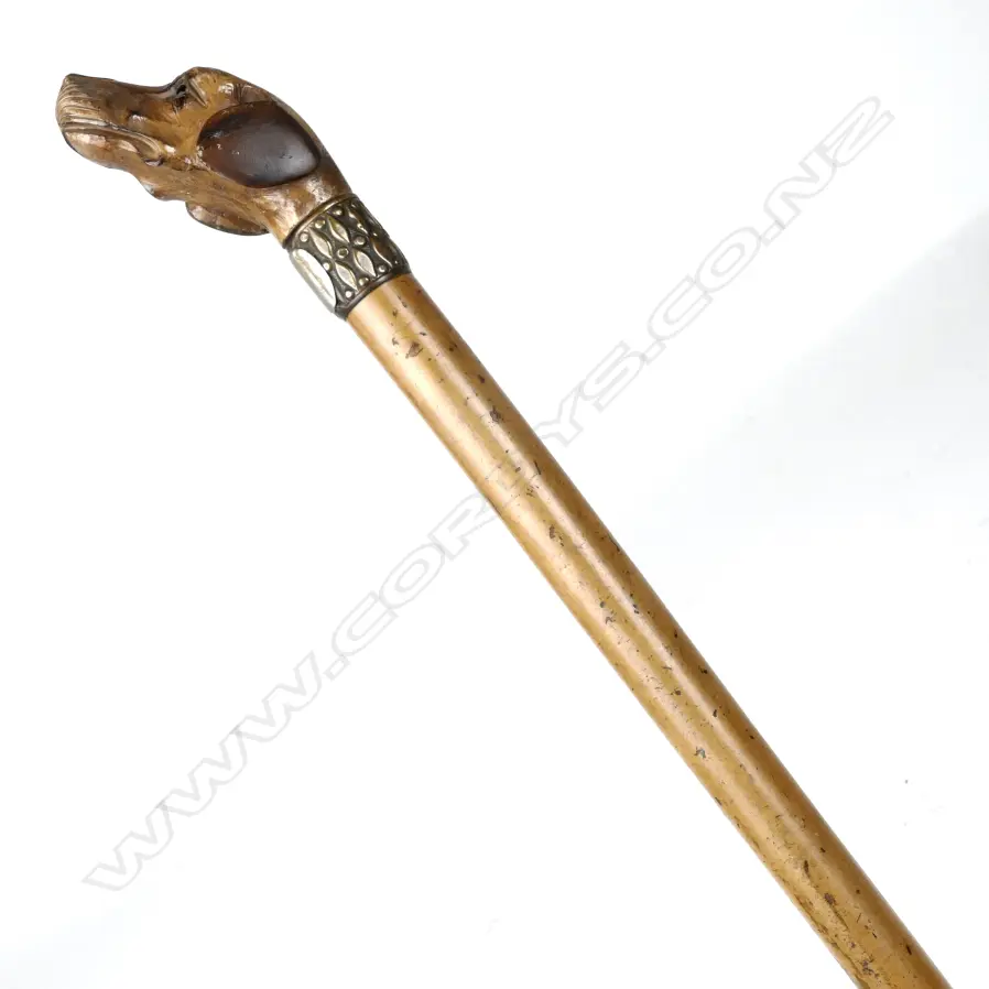 A vintage dog's head walking stick Image 1++