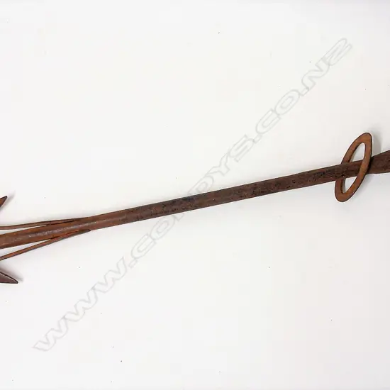 An old forged iron whaling harpoon head