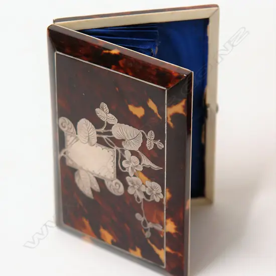 A Victorian tortoiseshell inlaid card case