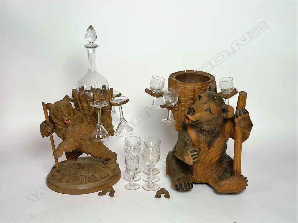 Two Black Forest carved decanter stands Image 1++