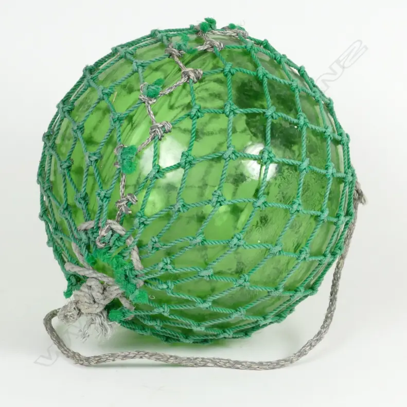 A large green glass fishing float Image 1++