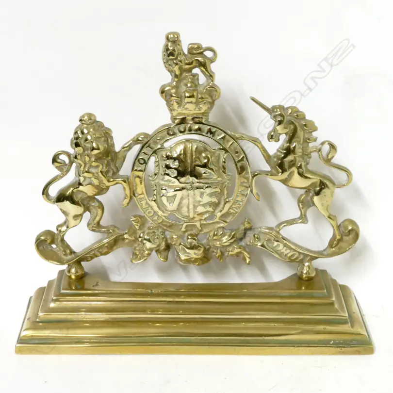 A vintage brass door stop Image 1++