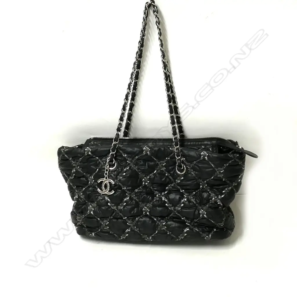 An authentic pre-owned Chanel medium tote bag Image 1++