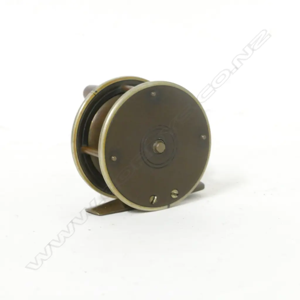 A brass 2¼" plate wind reel Image 1++
