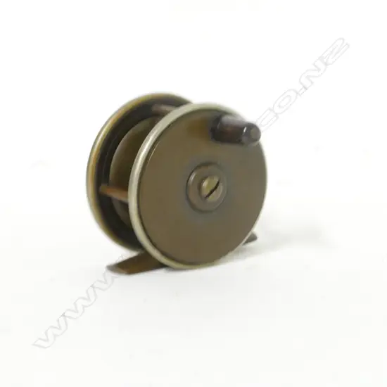 A brass 2¼" plate wind reel