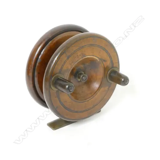 A 4" wooden reel with brass fittings