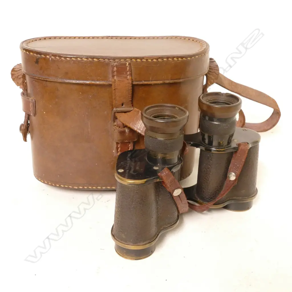A pair of WWI binoculars in leather case Image 1++