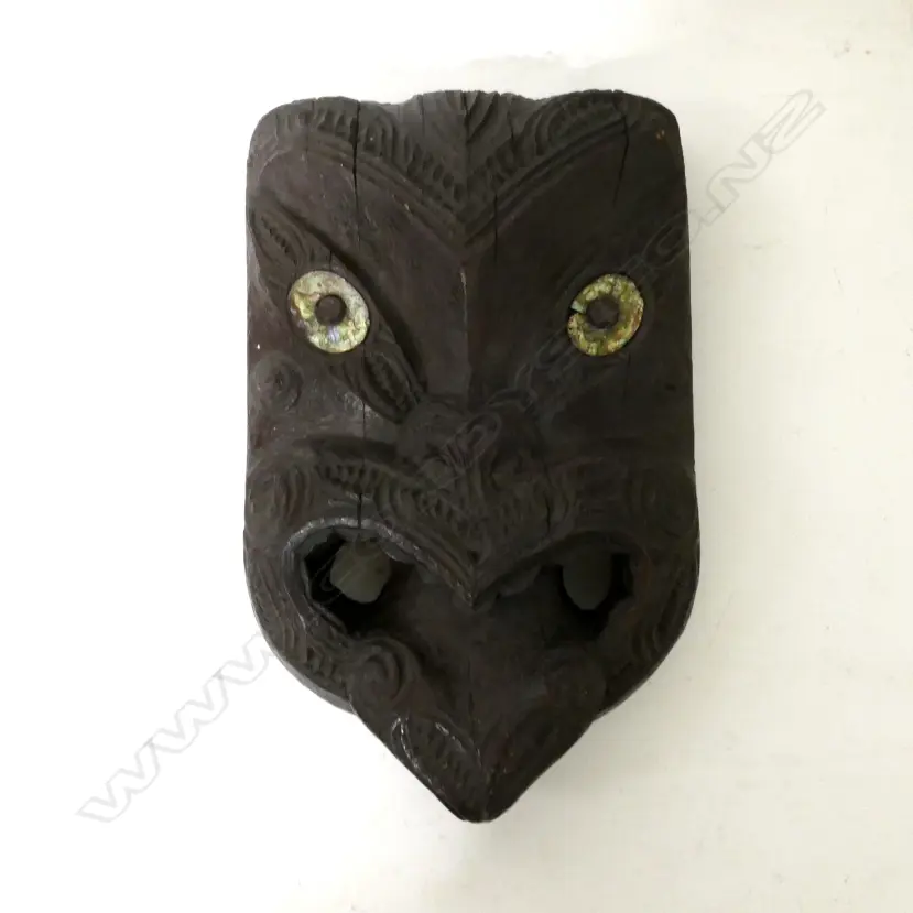 A decorative Maori wood mask carving Image 1++