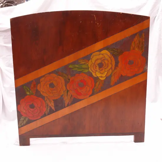 A pokerwork decorated fire screen