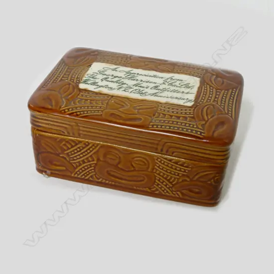 Crown Lynn Wharetana ware lidded trinket box of rectangular form decorated in the 'Rauponga Pattern' (#1002) the lid inscribed 'An Appreciation from George Harrison and Co Ltd...'