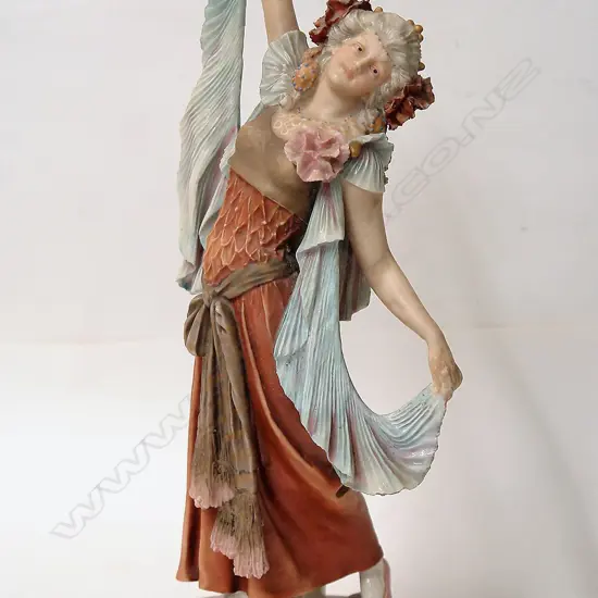 A Royal Dux porcelain figure of a dancing maiden
