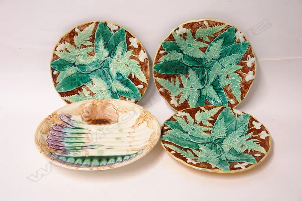 Four 19thC majolica relief moulded plates Image 1++