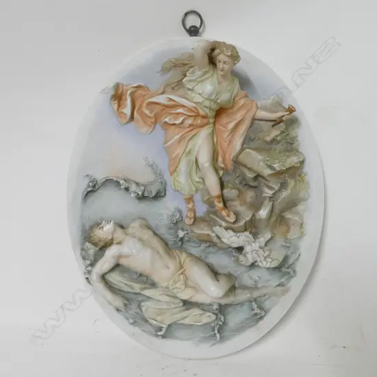 A pair of German porcelain wall plaques